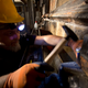 A Greek restoration expert clearing centuries of grime way from the tomb’s walls
